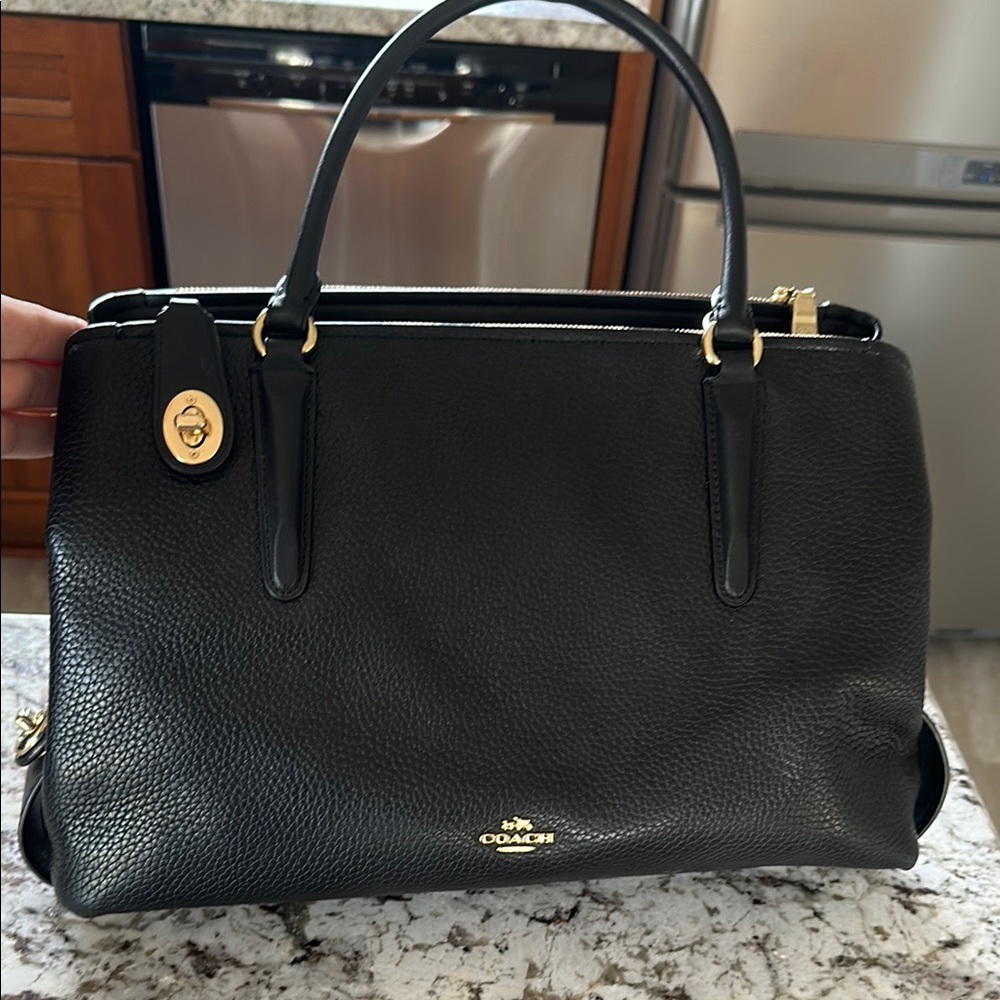 Coach Black Leather Satchel with Gold Accents-never used. Brand new.